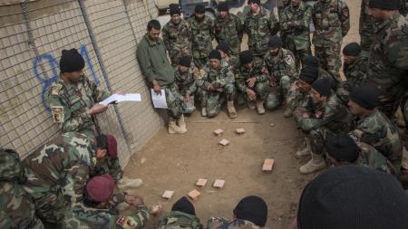 Afghan Army Commandos listen to OPORD briefing