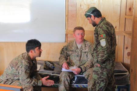 An SFAAT Advisor Provides Assistance to an ANA Counterpart