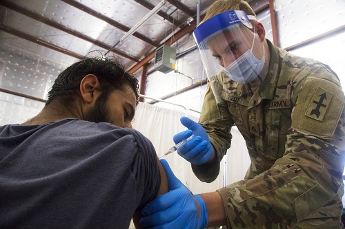 COVID-19 Vaccine administered to Afghan evacuee.